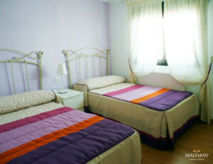 Dormitorio doble de la Casa del Lagos I